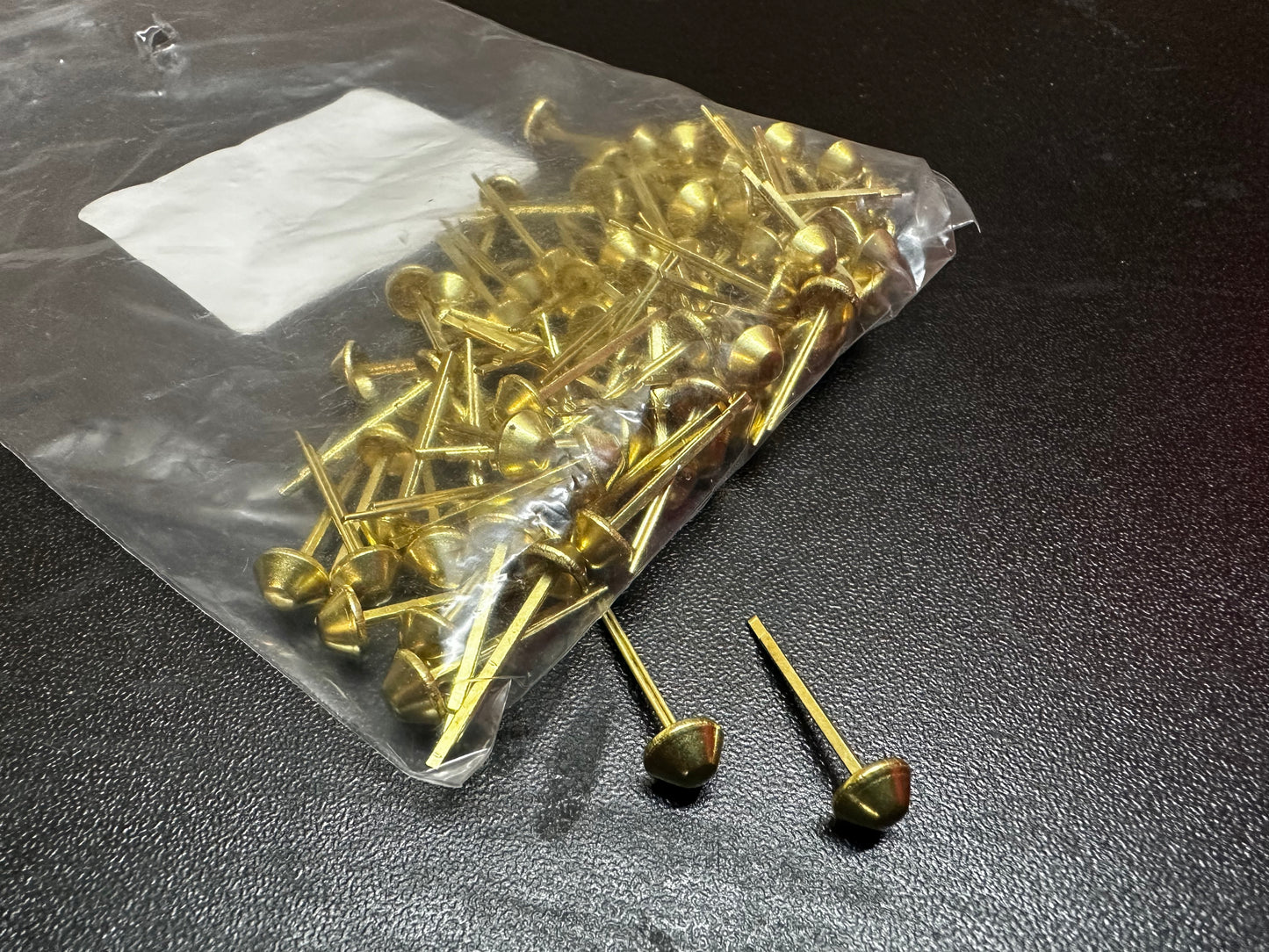 Cairns Brass Helmet Pins